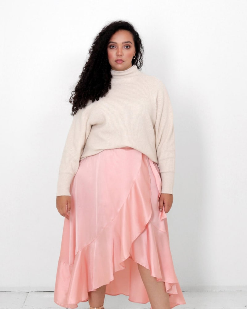 Front of a model wearing a size L (12/14) Juliette Wrap Skirt in Copper Blush by LuvMeMore. | dia_product_style_image_id:266558